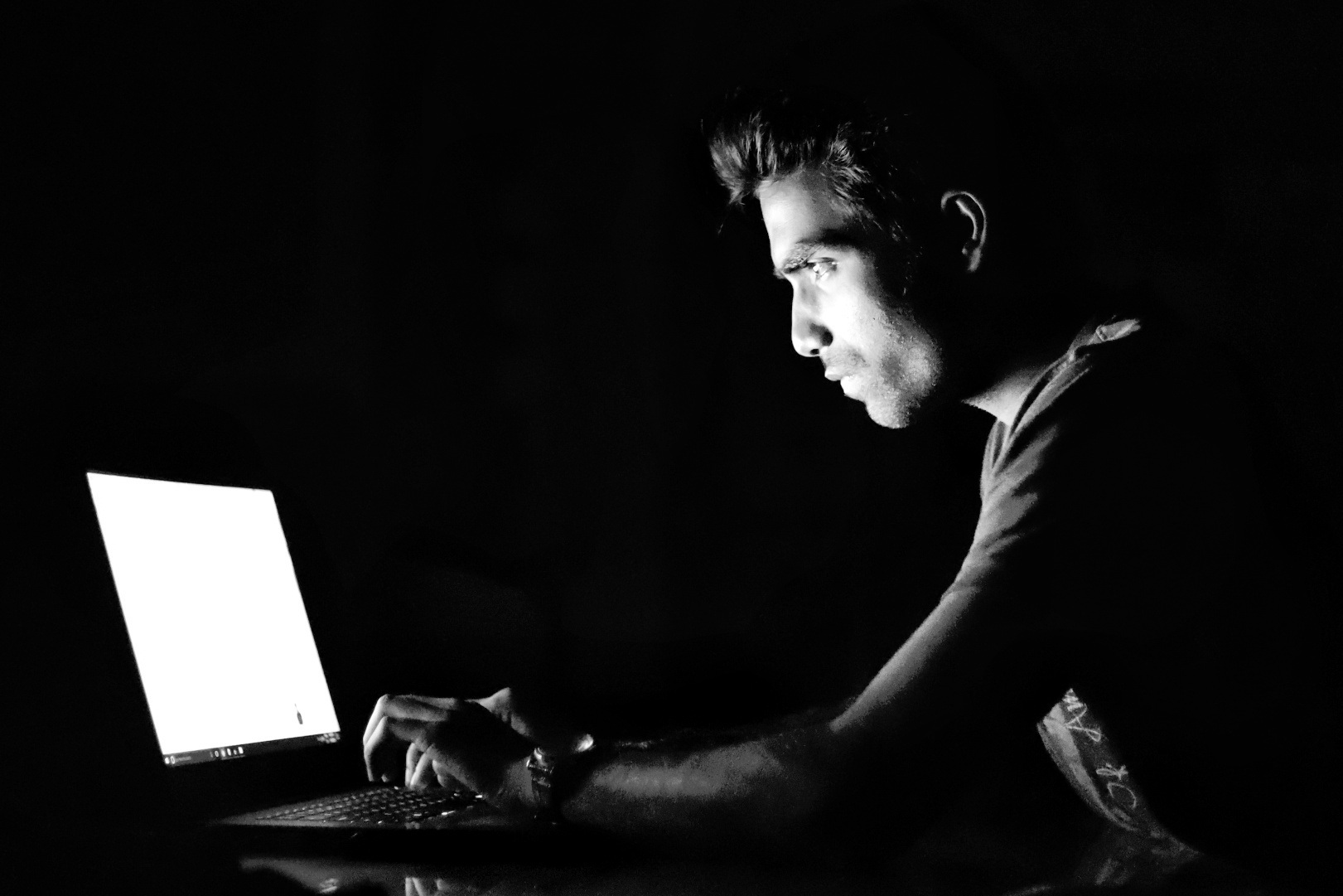 Guy in front of laptop